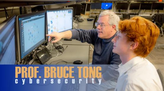 Prof. Tong works with student in the lab