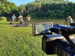 Students film the band CAAMP for the Nelsonville Music Festival