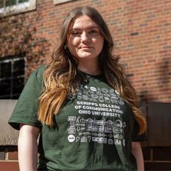 Kayla Payne wearing her award-winning T-shirt