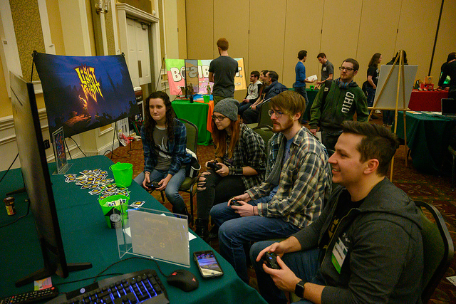 A group of students playing a video game