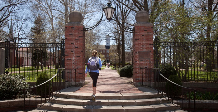 A student entering the green at Ohio University.