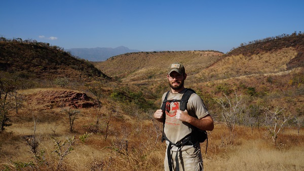 A photo of Eric Gorscak, a student in Biological Studies at Ohio University working in the field.