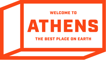 Red brick shape containing the words Welcome to Athens the best place on earth