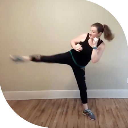 Woman performing a side kick