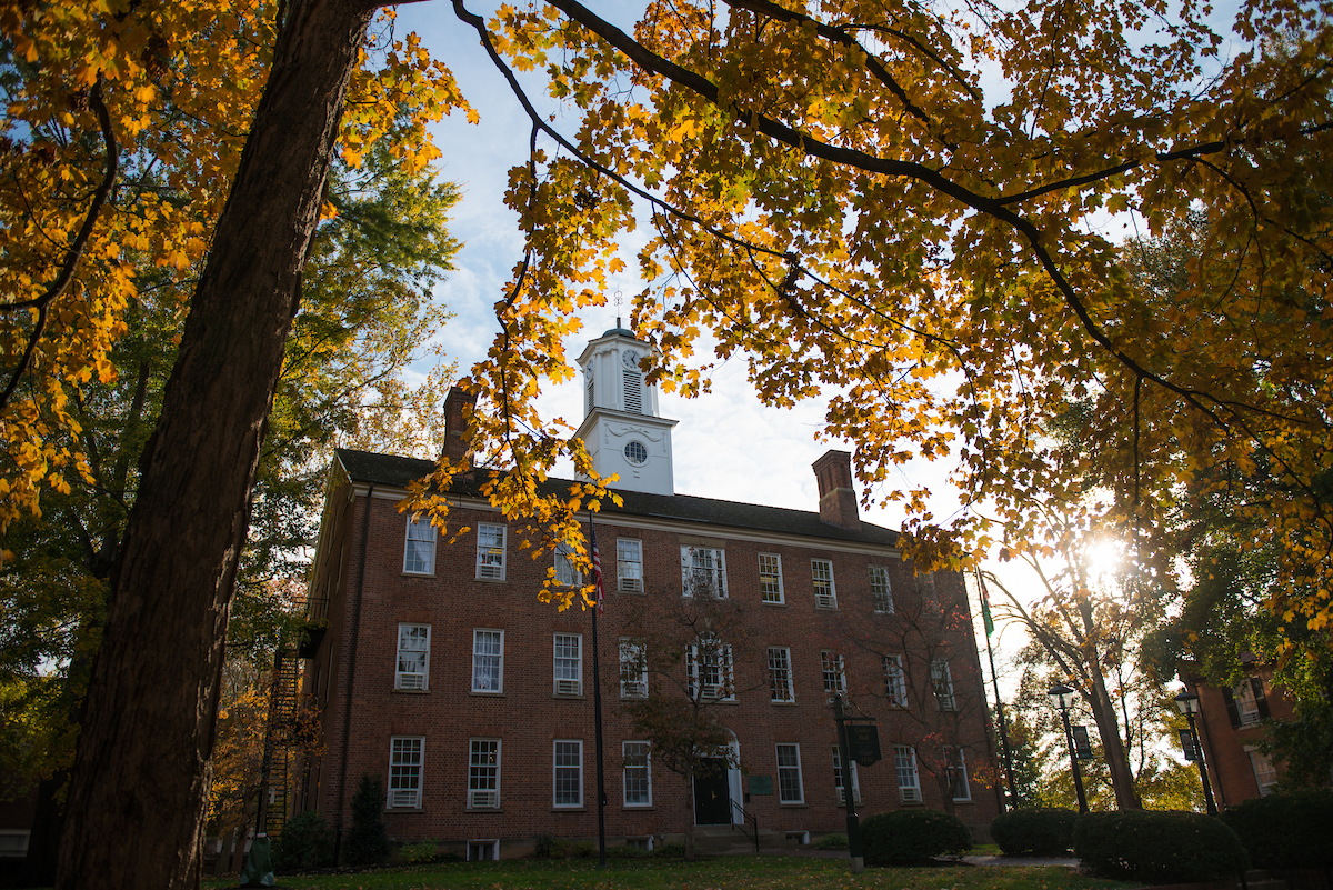 Photo of Cutler Hall in the fall, located on College Green