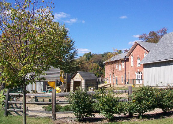 Photo of a playset at the Child Development Center, locat the The Ridges