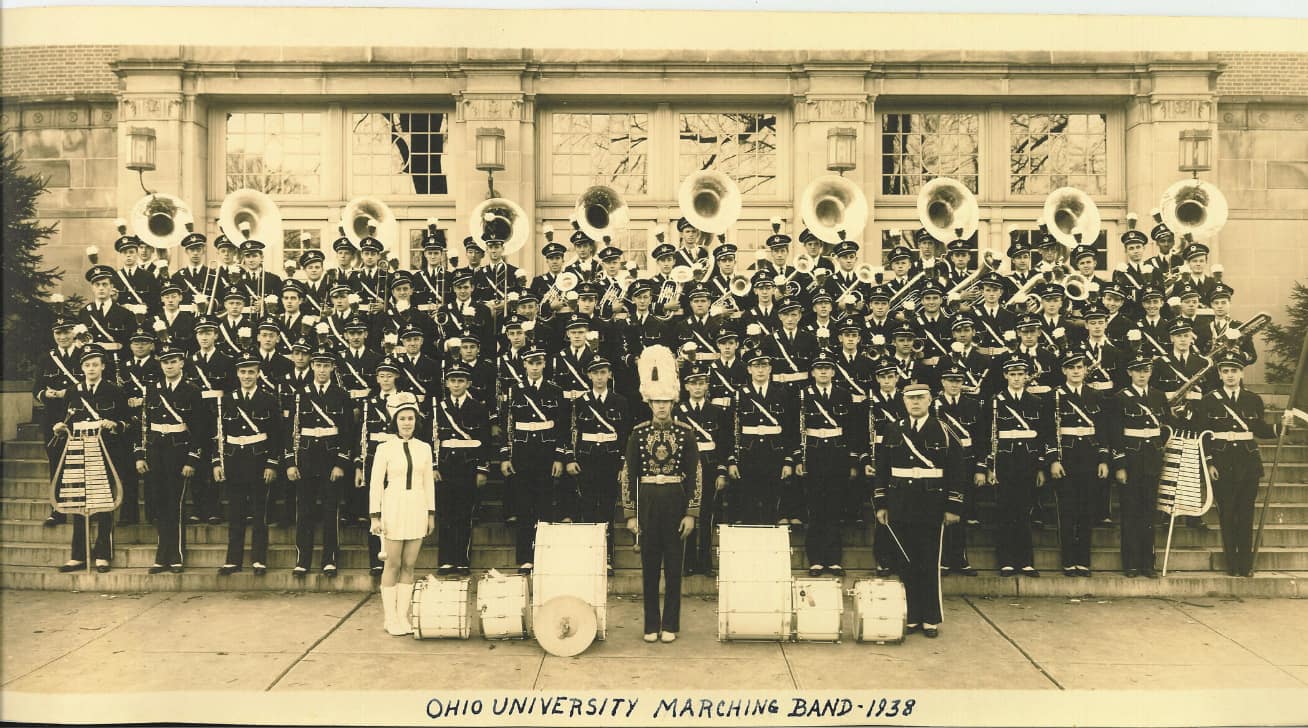 Formal photograph of the 1938 OU marching bank on stairs of Templeton-Blackburn Alumni Memorial Auditorium.