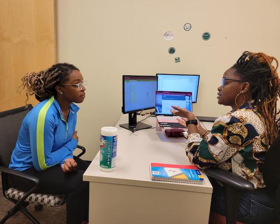 An Ohio University student meets with a LINKS Success Coach in her office