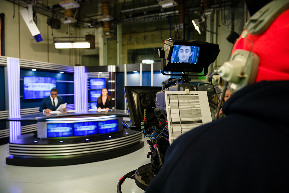 An Ohio University student works a camera at WOUB Public Media