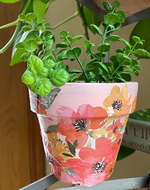 Decoupaged flower pot
