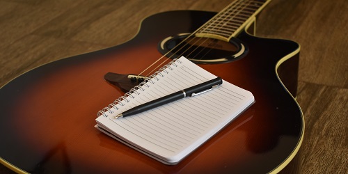 Guitar and a notepad