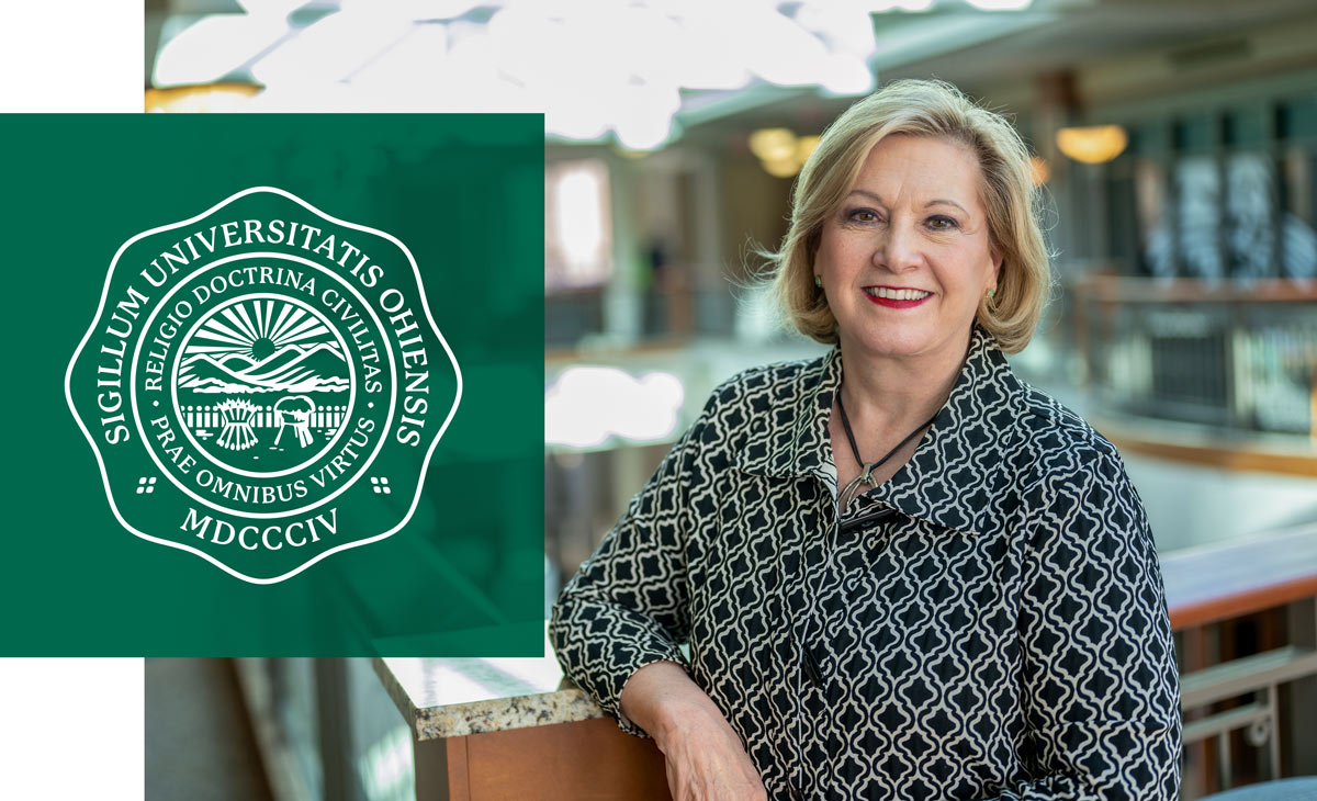 President Gonzalez standing in Baker Center with the Seal of Ohio University overlayed