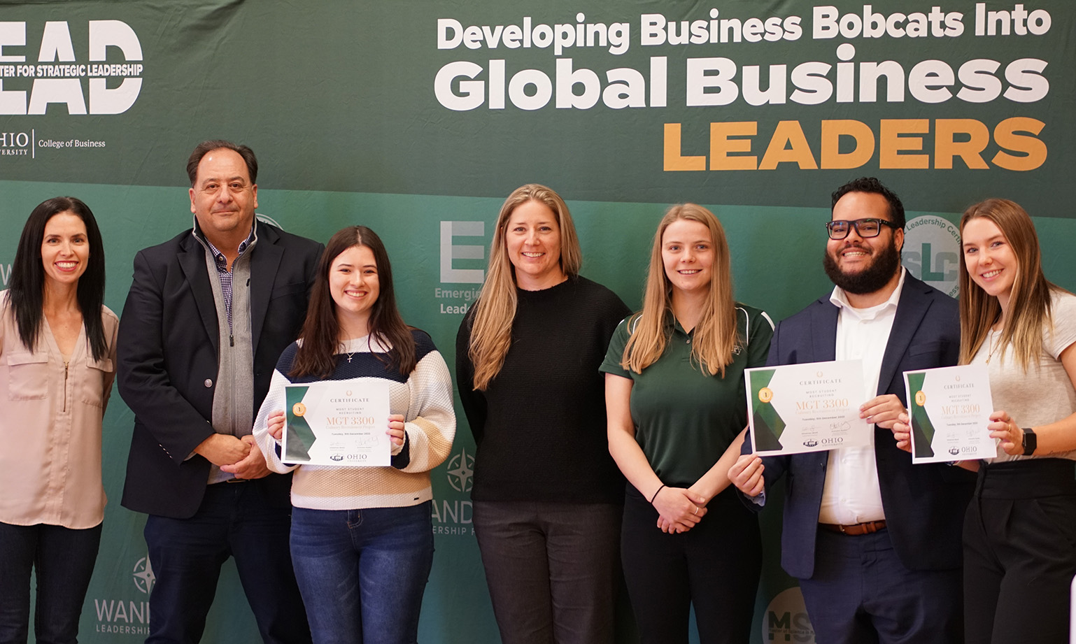 Students from the MGT 3000 class pose for a photo.