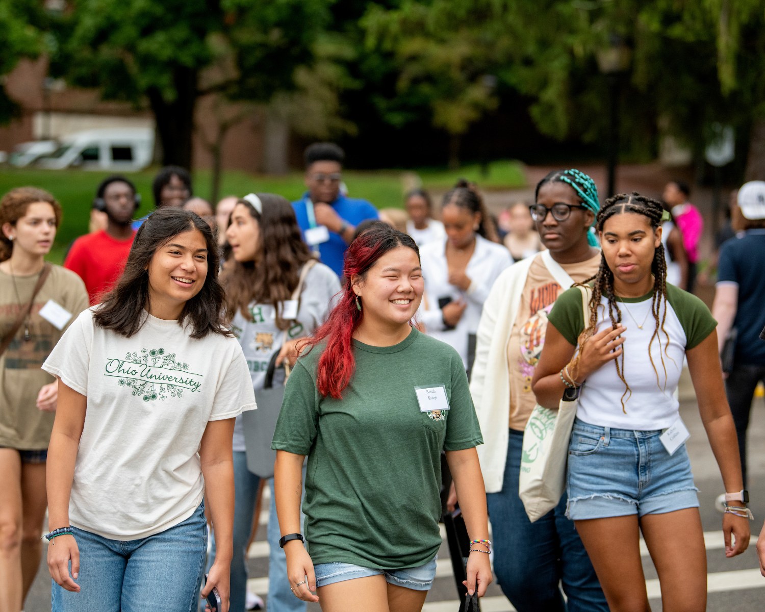 Students walking together during welcome program activity
