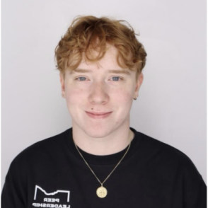 Student smiles for a professional portrait