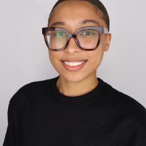 Student smiles for a professional portrait