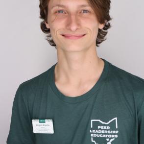 Student smiles for a professional portrait