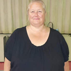 photo of woman in black tshirt, smiling
