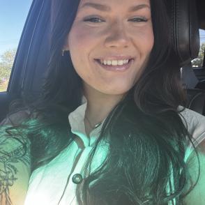 Woman with long hair smiling