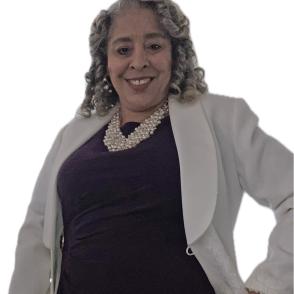 Woman in blazer with hand on hip, smiling