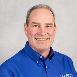 image of a white male smiling wearing a blue button down shirt4