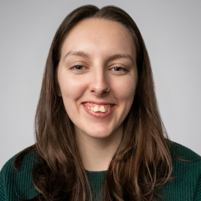 Portrait of graduate MacKennia Hughes smiling
