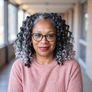 Portrait of Teresa McKenzie in pink sweater