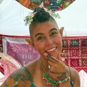 A photo of a woman in a fairy costume