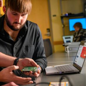 technology team works on computer hardware