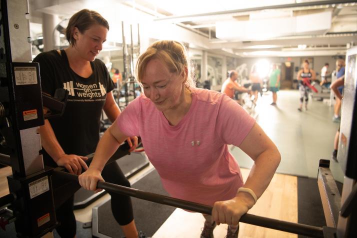 Jenn Bennett (left) and Christine Griffin (right) in the WellWorks fitness center