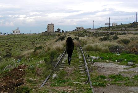 Person walking along the abandoned railway in Beirut, Lebanon
