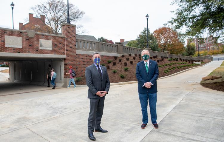 City of Athens Mayor Steve Patterson (left) and Ohio University President M. Duane Nellis stand near the newly completed Richland Avenue Passageway.