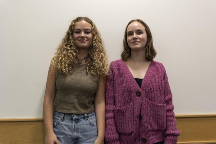 Ohio University Sunrise Movement co-presidents Maeve Fellerhoff (left) and Celia Hawk (right) pose for a portrait in Alden Library in Athens, Feb. 4, 2025. Photo by Ethan Herx | The Post