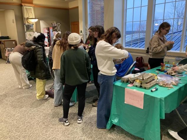 Ohio University students gathered on the Third Floor Atrium of Baker Center Wednesday to make Valentine’s Day gifts using scrap paper, pinecones and egg cartons.