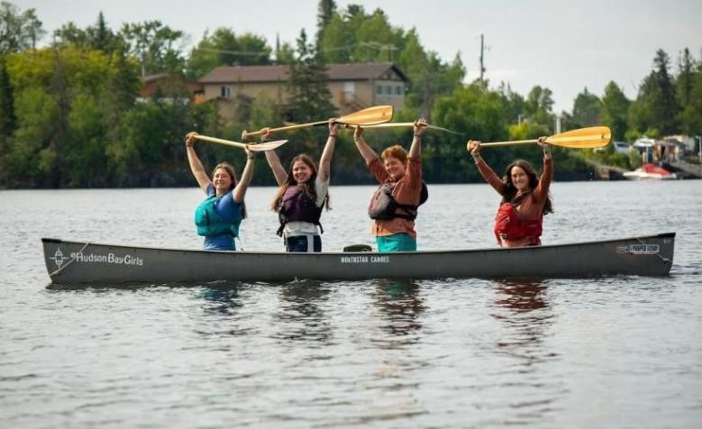Hudson Bay Girls on a canoe as a part of Helena's 1200 canoe journey.