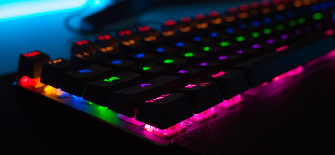 Close-up of gaming keyboard with different colored backlights