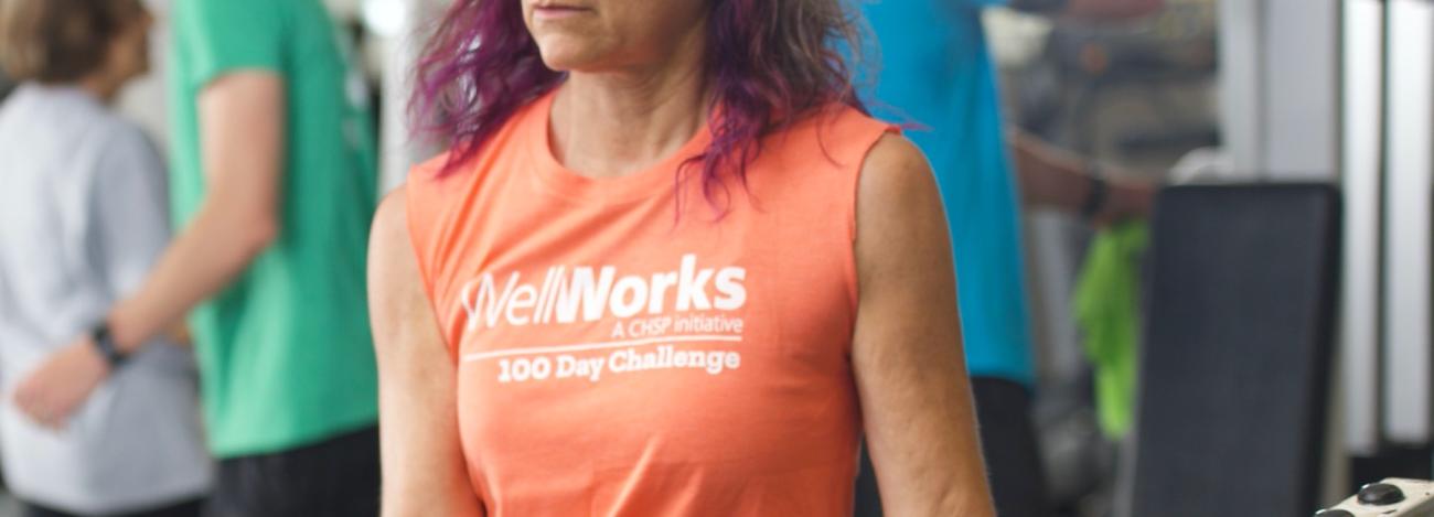 Member wearing a 100 Day Challenge t-shirt