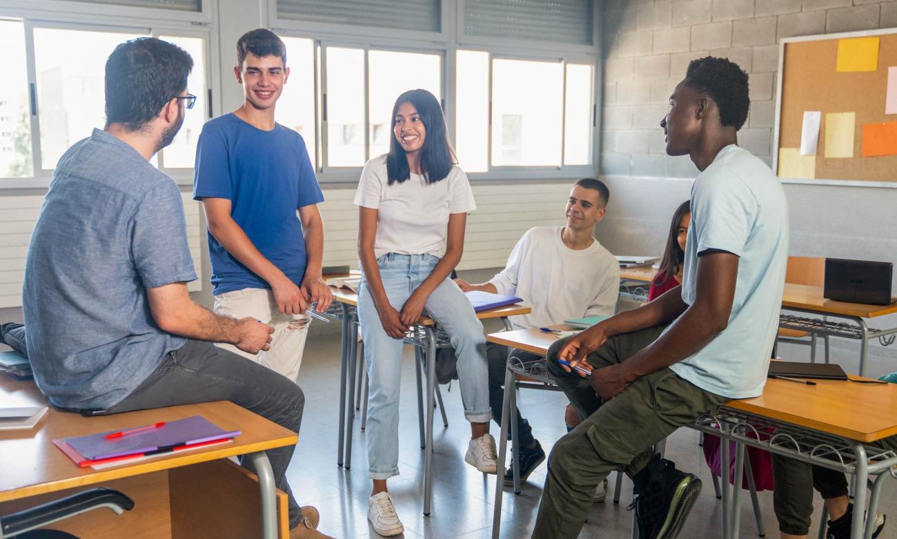 School counselor with group of high school students