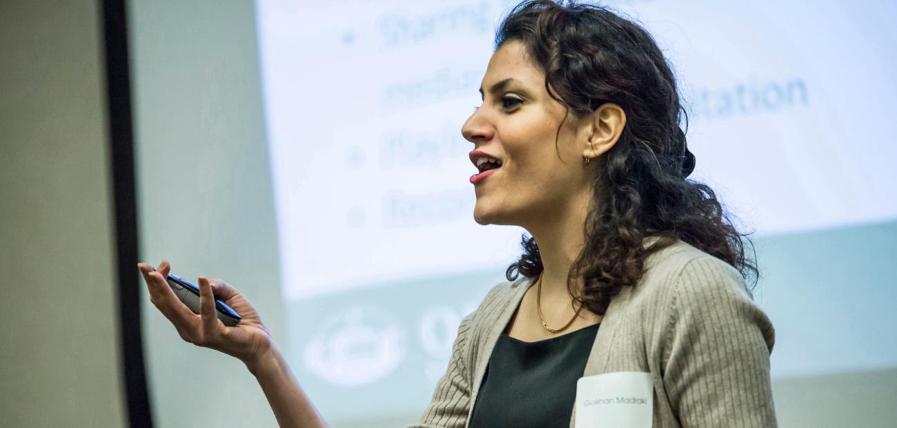 A female student presents her work