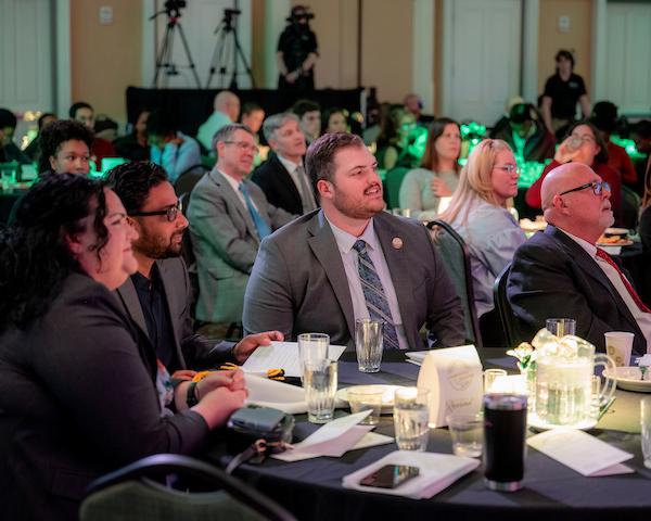 Attendees sitting at Leadership Awards Table