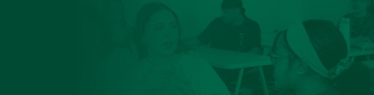 Students in a classroom setting participating in a discussion