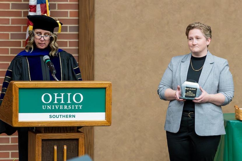 Leadership Award winner Megan Rookard and Dean Marinski on stage