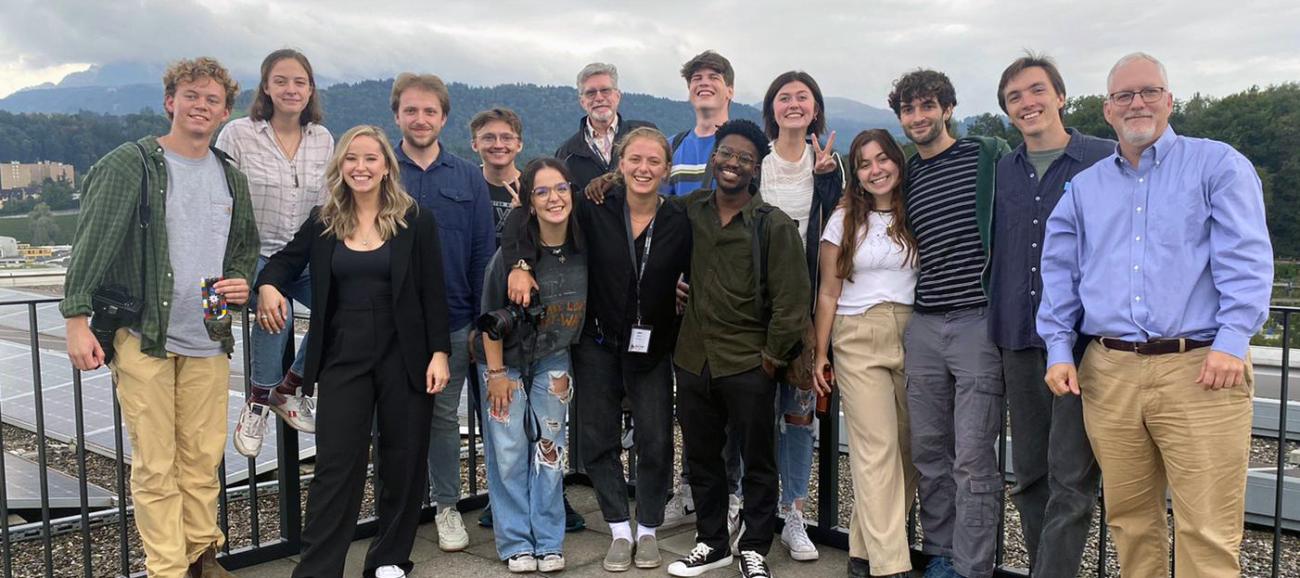 Students and faculty pose for a photo in Switzerland.