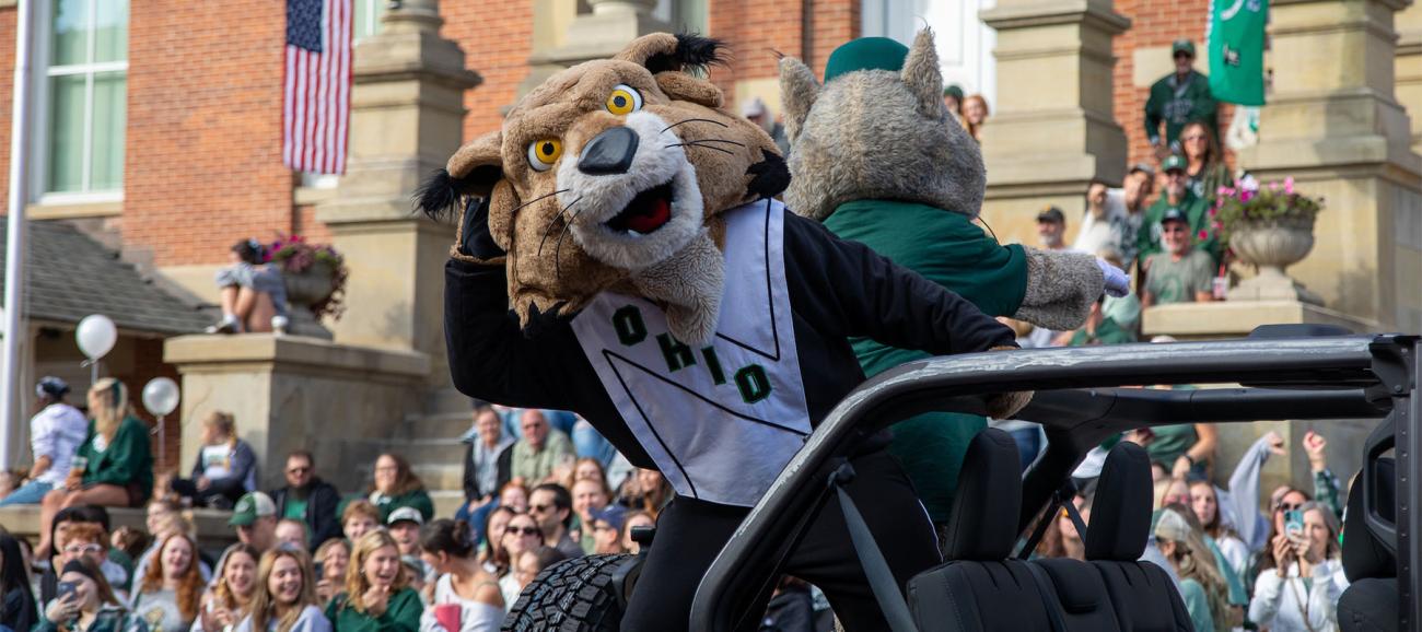 Rufus the Bobcat poses for a photo during the Homecoming Parade.