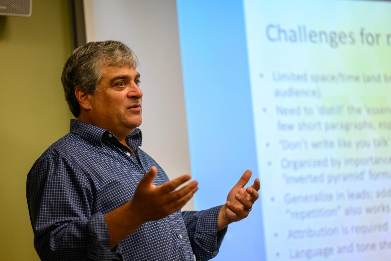 Man presenting to a classroom