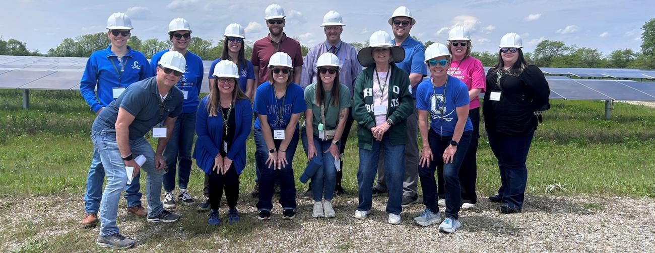 educators tour a solar field