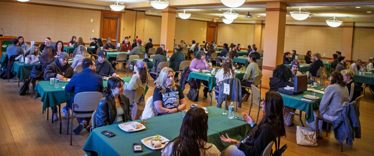 Room full of small group discussions