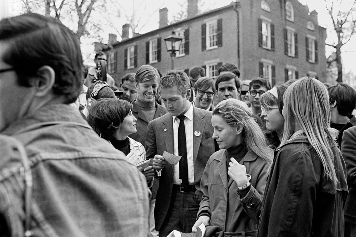 Paul Newman stands in a crowd of fans at Ohio University