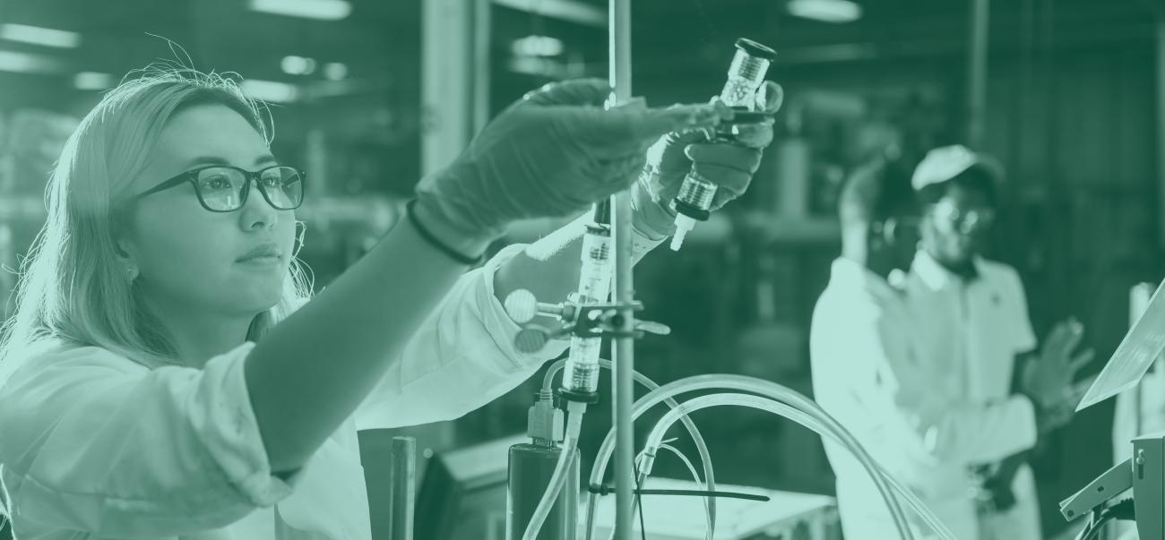 Ohio University student uses scientific equipment in a research lab