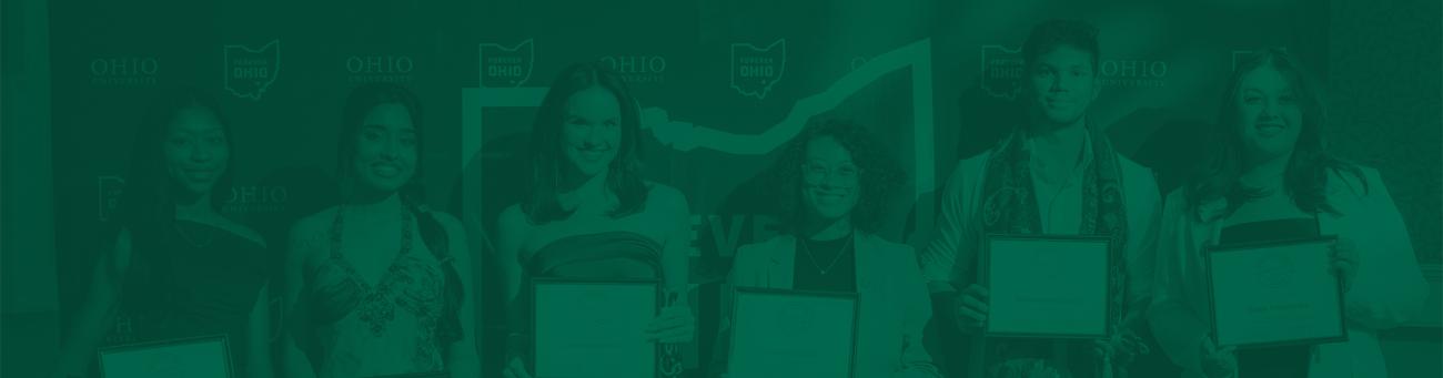 Students pose for a photo at an awards ceremony.